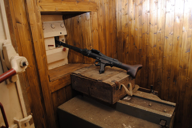 A machine gun position guards the entranceway
