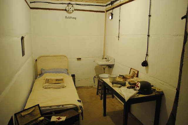 First aid supplies and a cot in the medical room